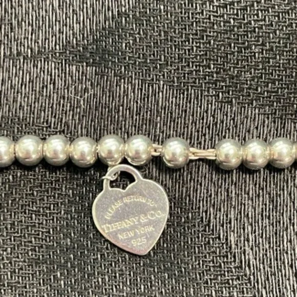 Pre-Owned Tiffany & Co. Bead Bracelet with Heart Pendant, Including Original Blu - Picture 2 of 5